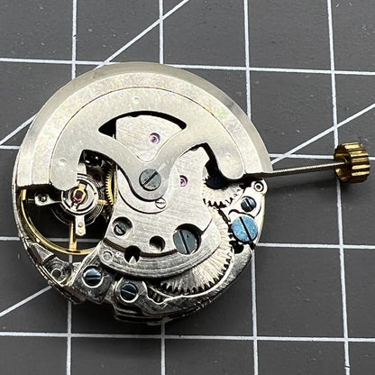 DANDONG 26.5mm silver hollow automatic watch movement featuring detailed gears and mechanical precision.