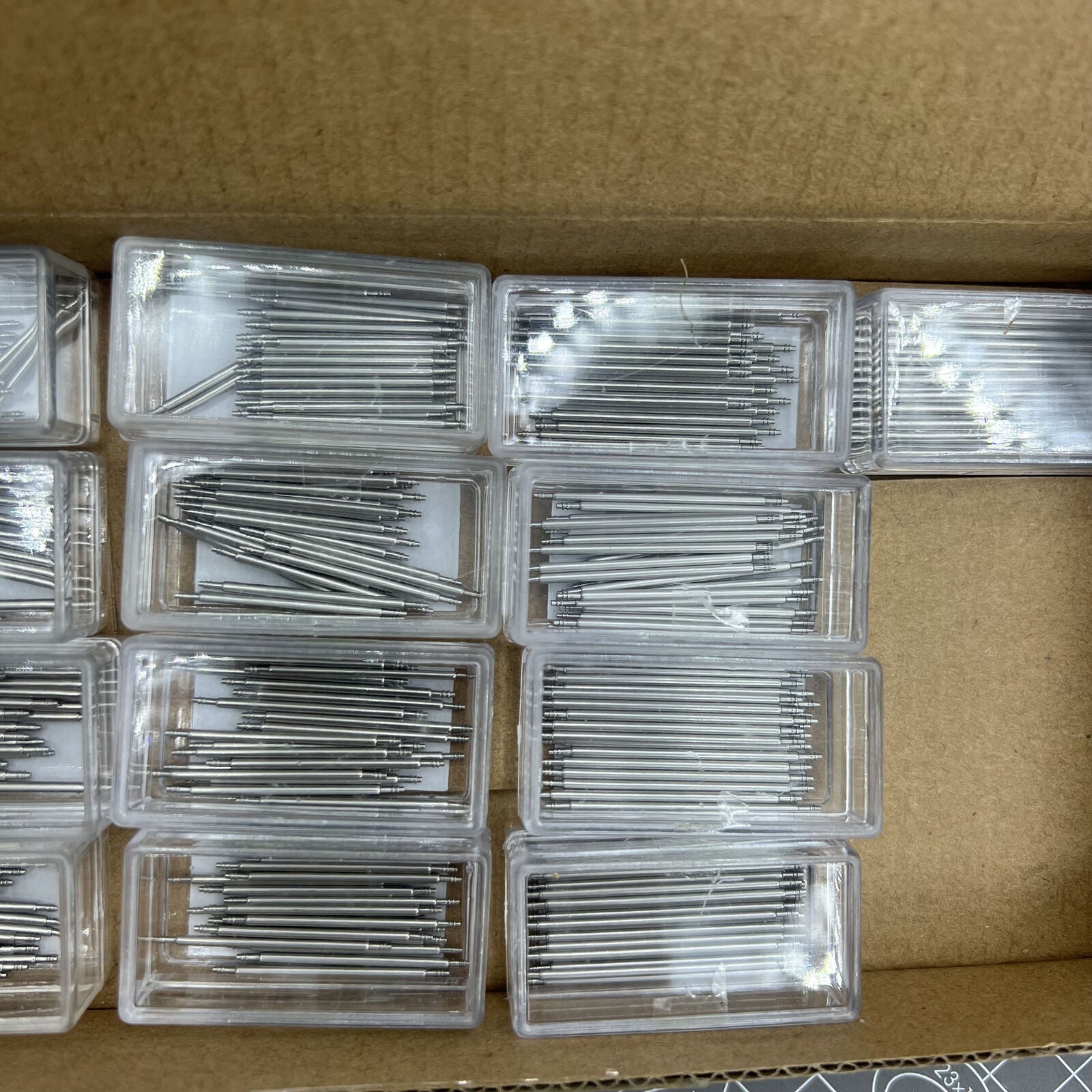 Set of 260 AB-605EL150 stainless steel extra long 1.5mm spring bars for secure watch strap attachment.