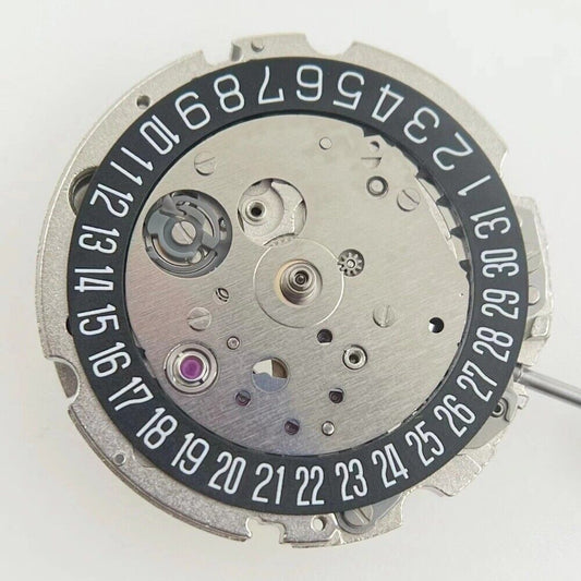Miyota/Citizen 8215 watch movement with black dial, date at 6, automatic mechanical precision, Japan-made.