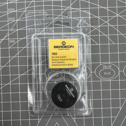 Swiss Bergeon 7922 tool for precise closing of mainspring covers in watch repairs.