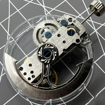 Asian LG0807 silver rectangular balance wheel watch movement showcasing intricate mechanical automatic design.