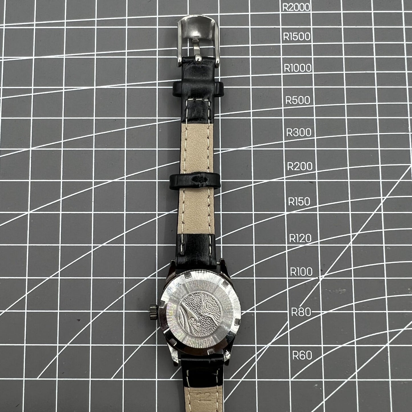 Seagull black case ladies watch with gold nail markers, manual movement, and shock resistance for elegant wear.
