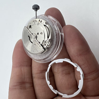 Miyota/Citizen 8215 automatic watch movement with black dial, date at 6 o'clock, Japan made.