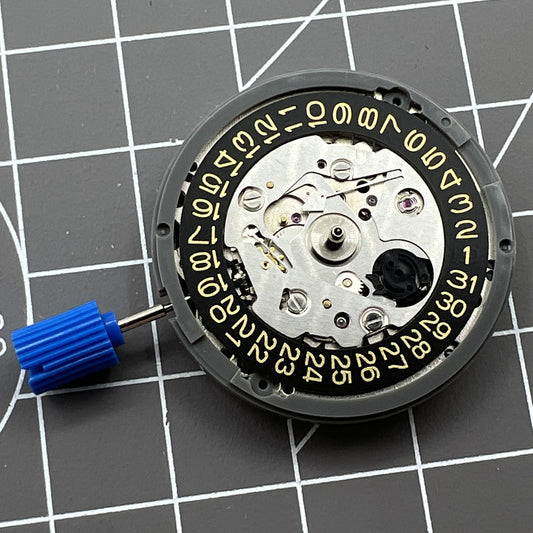 NH35A automatic mechanical watch movement with golden date display, crown at 3 o'clock, ideal for SKX007 models.