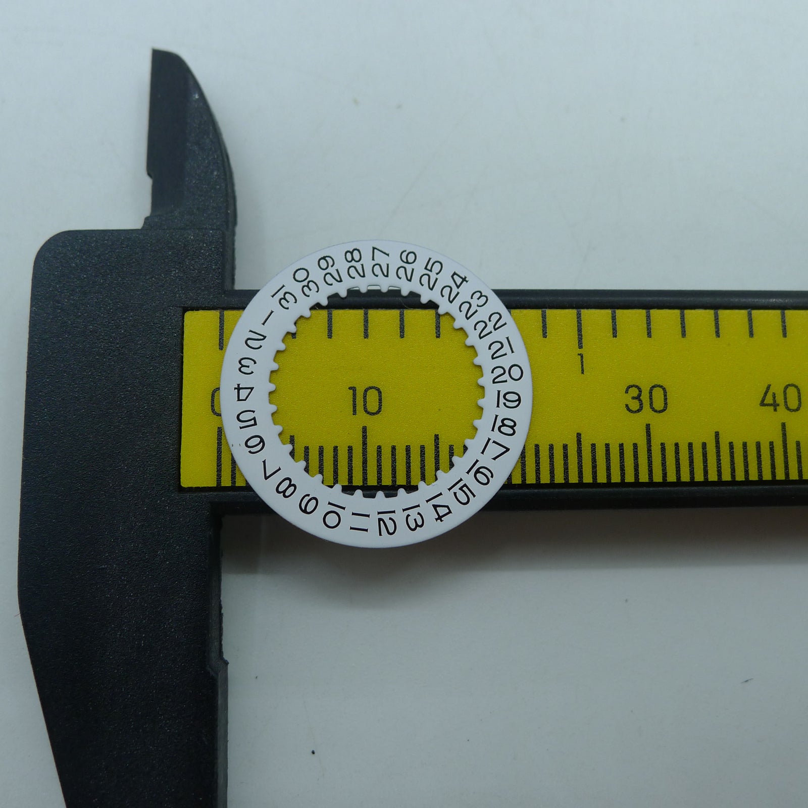 White date disk wheel for RLX 3235 watch movement, reliable replacement part ensuring precise date display by brand RLX.
