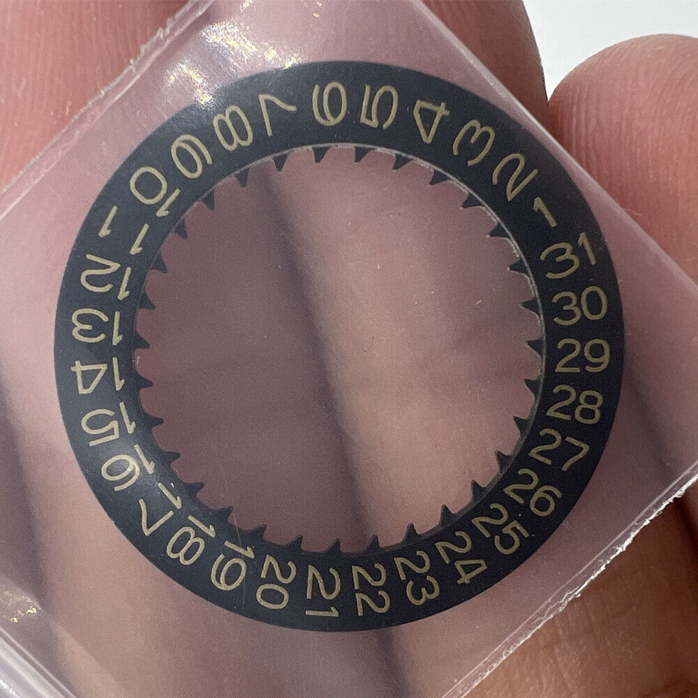 Golden date wheel with black background for NH35 NH36 watch movement, enhancing dial visibility.