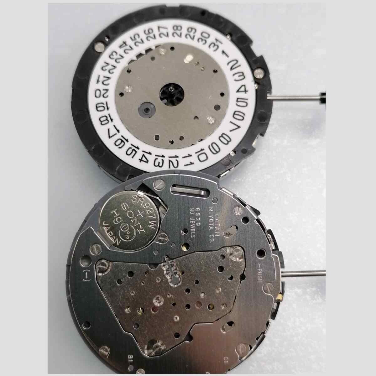 Miyota 6S30 quartz watch movement with date at 4 o?clock and small seconds at 2, 6, and 10 markers.