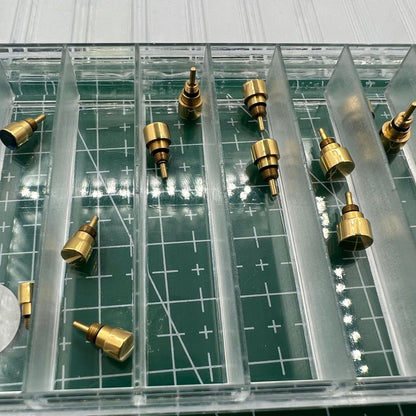 Golden stainless steel classical watch with pusher drive, elegant design by Wholesale Watch for formal occasions.