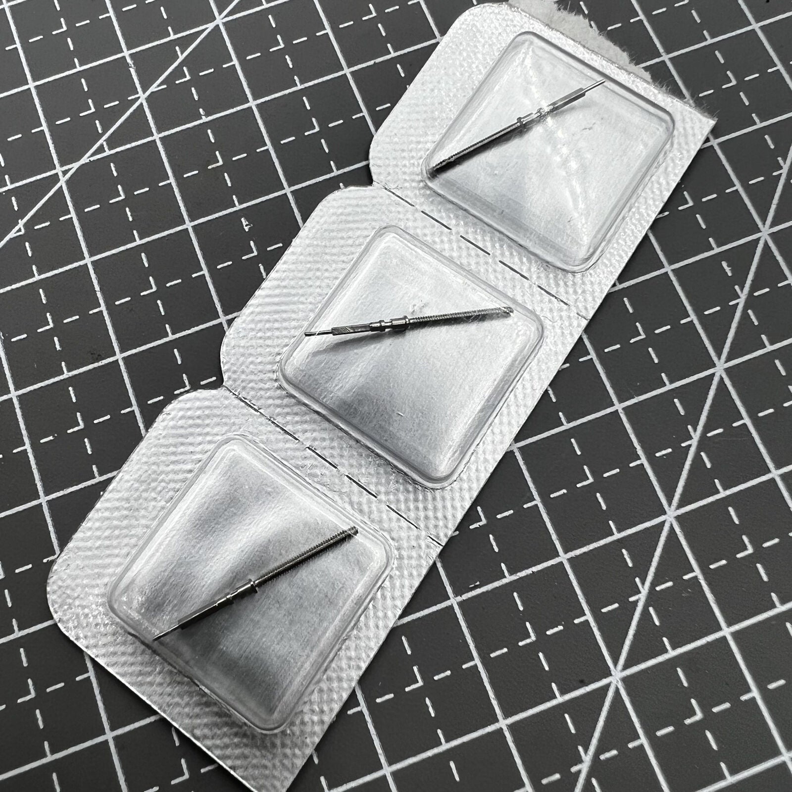 Original Omega 8500 watch winding stem designed for precise movement repair in luxury timepieces.