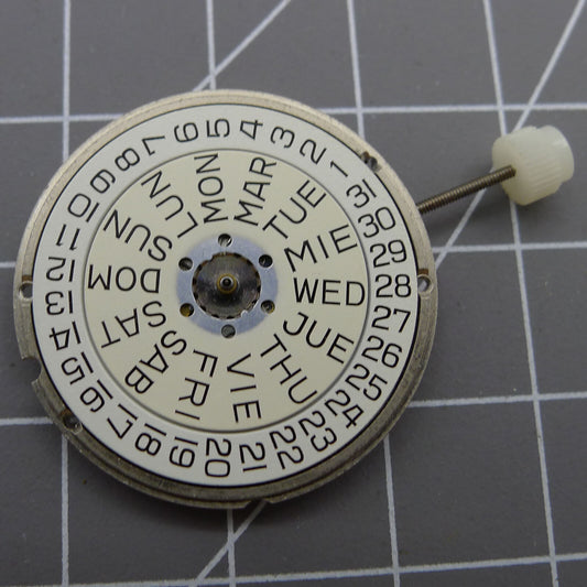 ETA 955.124 Swiss quartz movement with day-date function, ideal for precision watch repair parts.