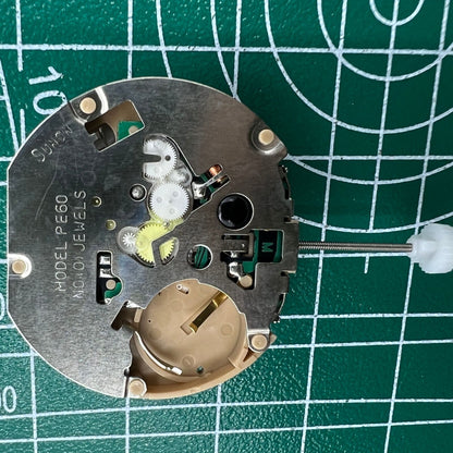 Sunon PE60 quartz watch showing date at 3, small seconds at 6, with elegant 3-hand design.