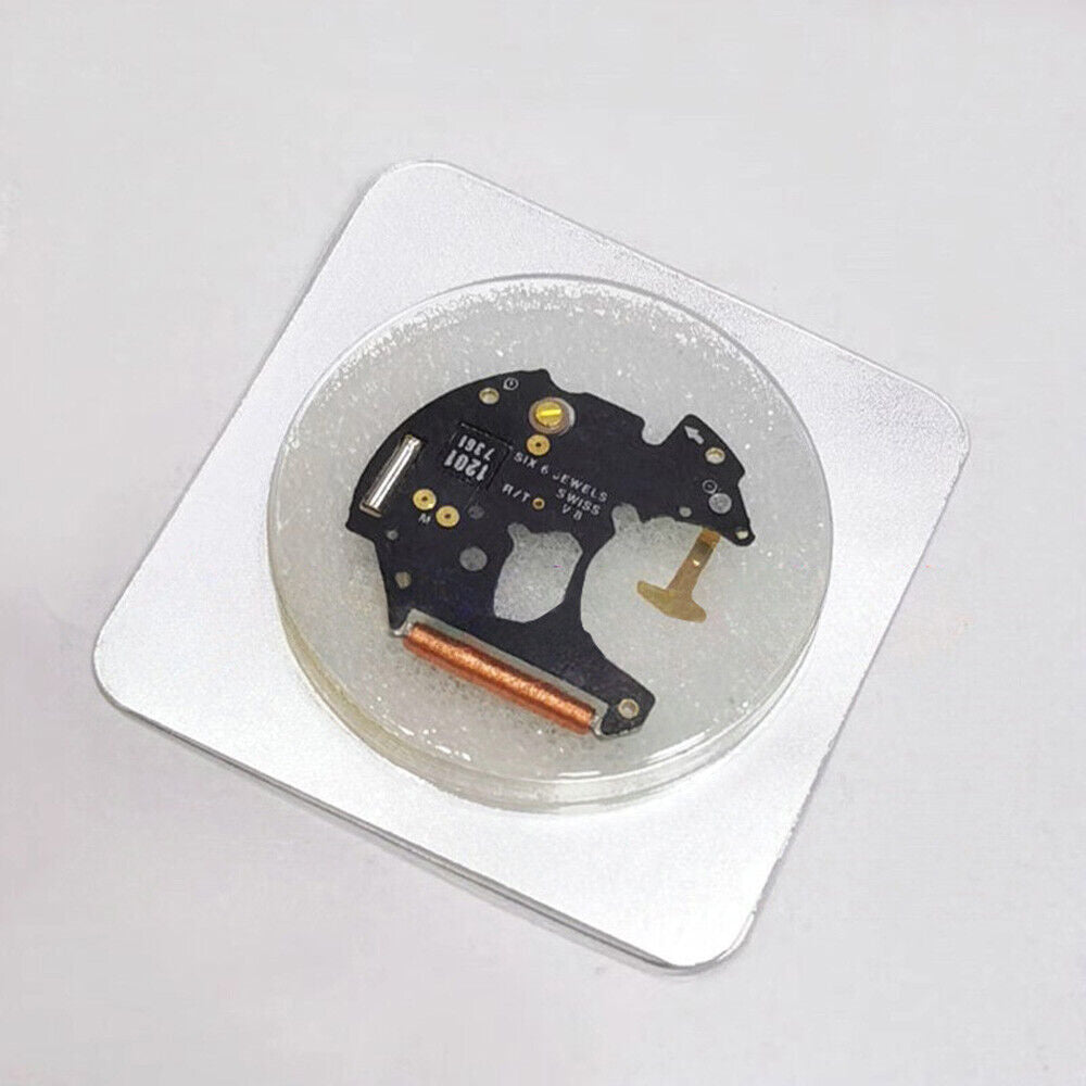 Disassembled ETA 255.111 watch movement circuit board for precise replacement parts.
