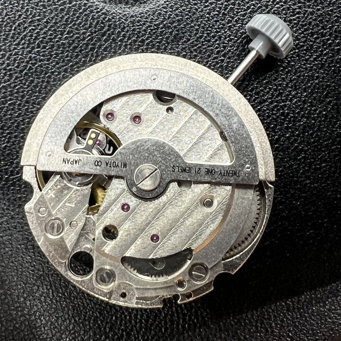 Miyota Citizen 82S7 silver plated automatic watch movement, precise mechanical performance for watch repairs.