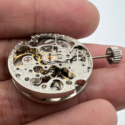 Silver Hollow Extra Large watch featuring visible automatic mechanical movement and elegant design.