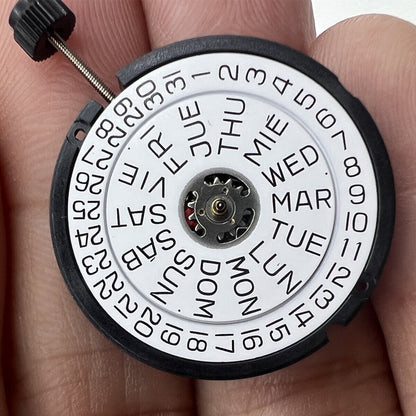 ETA 805.122 Swiss quartz watch movement with day/date, three hands for precise timekeeping.