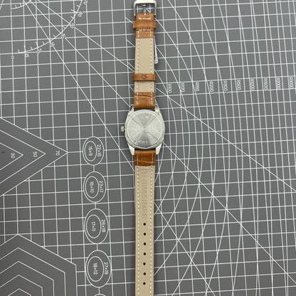 32mm Chunlan manual watch with silver dial, 17-jewel movement, and classic mechanical design.