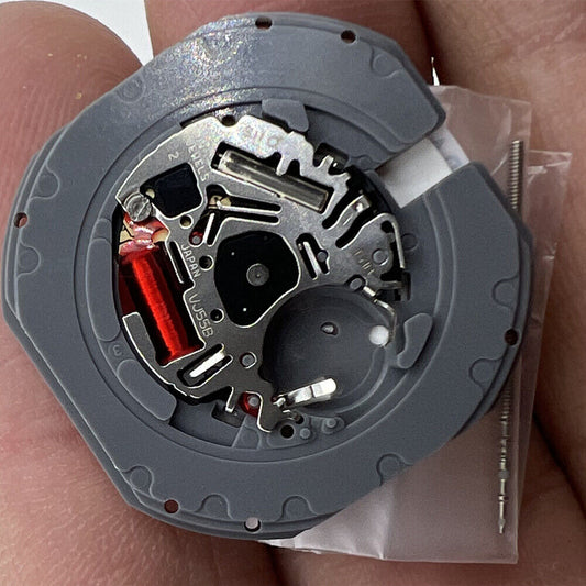Hattori Epson TMI VJ55 quartz watch movement with date display at 3 and 6 o'clock, Japan made.
