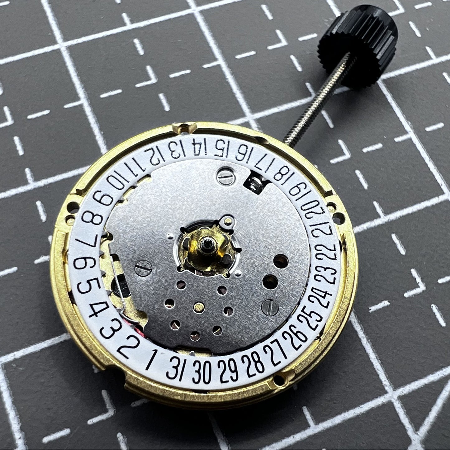 Swiss ETA F03.111 quartz watch movement with 3 hands and date at 6 o'clock, precision timekeeping.