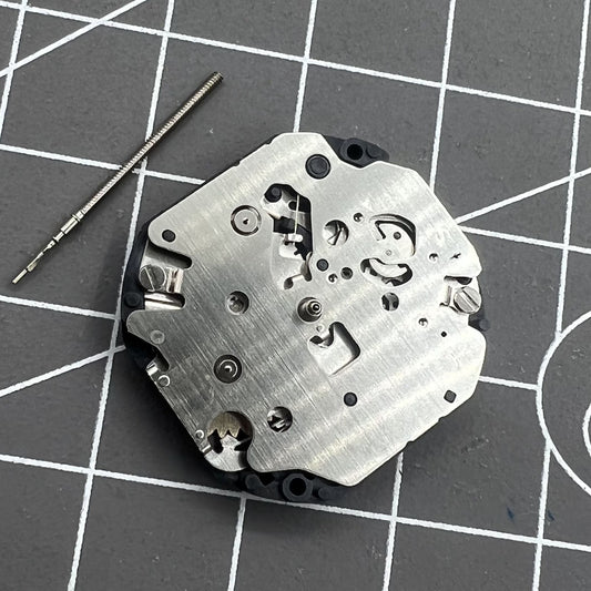 Hattori Epson TMI VX3S quartz watch movement with stem, precise timekeeping for watch repairs
