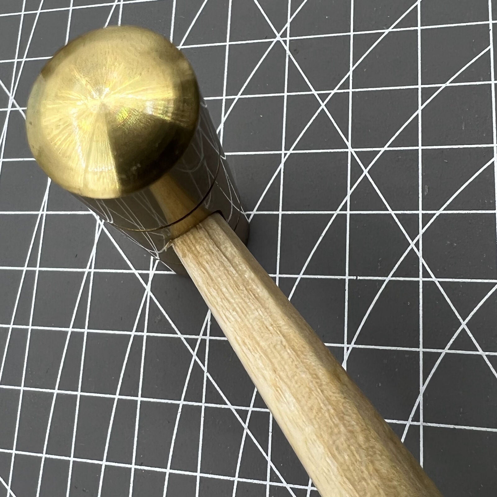 Bergeon 30416 Swiss Made brass hammer for precise watch accessory adjustments and delicate repairs.