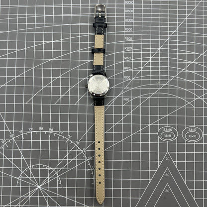 Seagull black case ladies manual mechanical watch with gold markers, shock-resistant for daily wear.