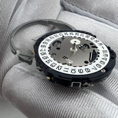 Hattori Epson TMI YM64A quartz watch movement, Japan-made, ensuring precise timekeeping for watch repairs.