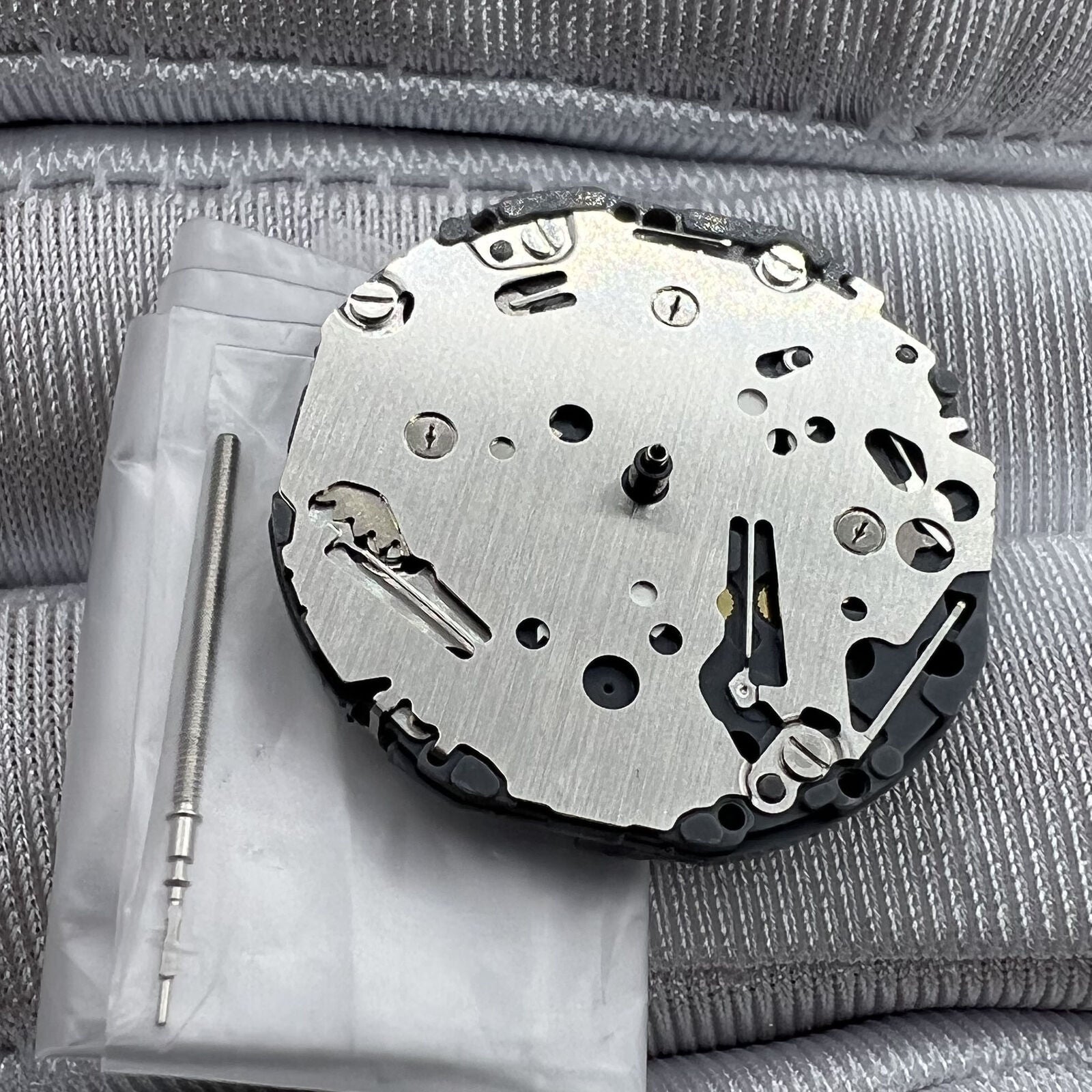 Hattori Epson TMI VH63A quartz watch movement from Japan displaying precise mechanical components.