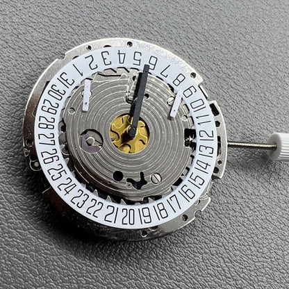Swiss Made ISA 8171 silver quartz watch with 5 hands and date at 6 o'clock, elegant design.