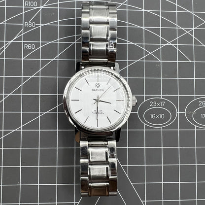 37mm China Baihua manual mechanical watch with silver dial, 19 jewels, shock-resistant design for durability.