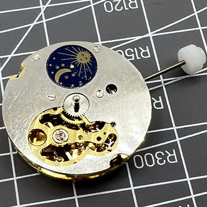 Skeleton dial Generic 8205 mechanical watch showing star phase and small seconds at 5 o?clock.