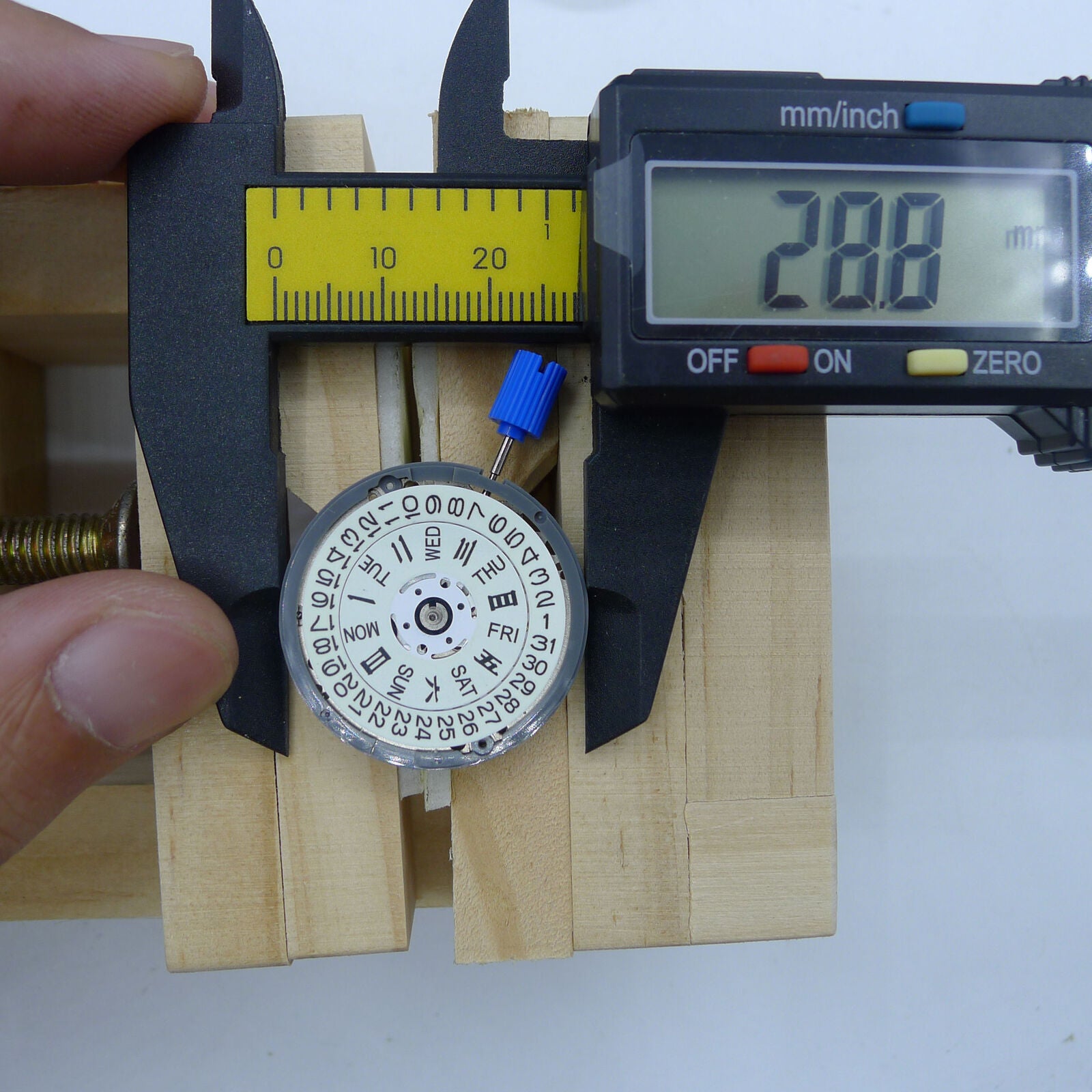Miyota NH36A automatic watch movement with white dial, green luminescent hands, and precise 3/3.8 crown positions.