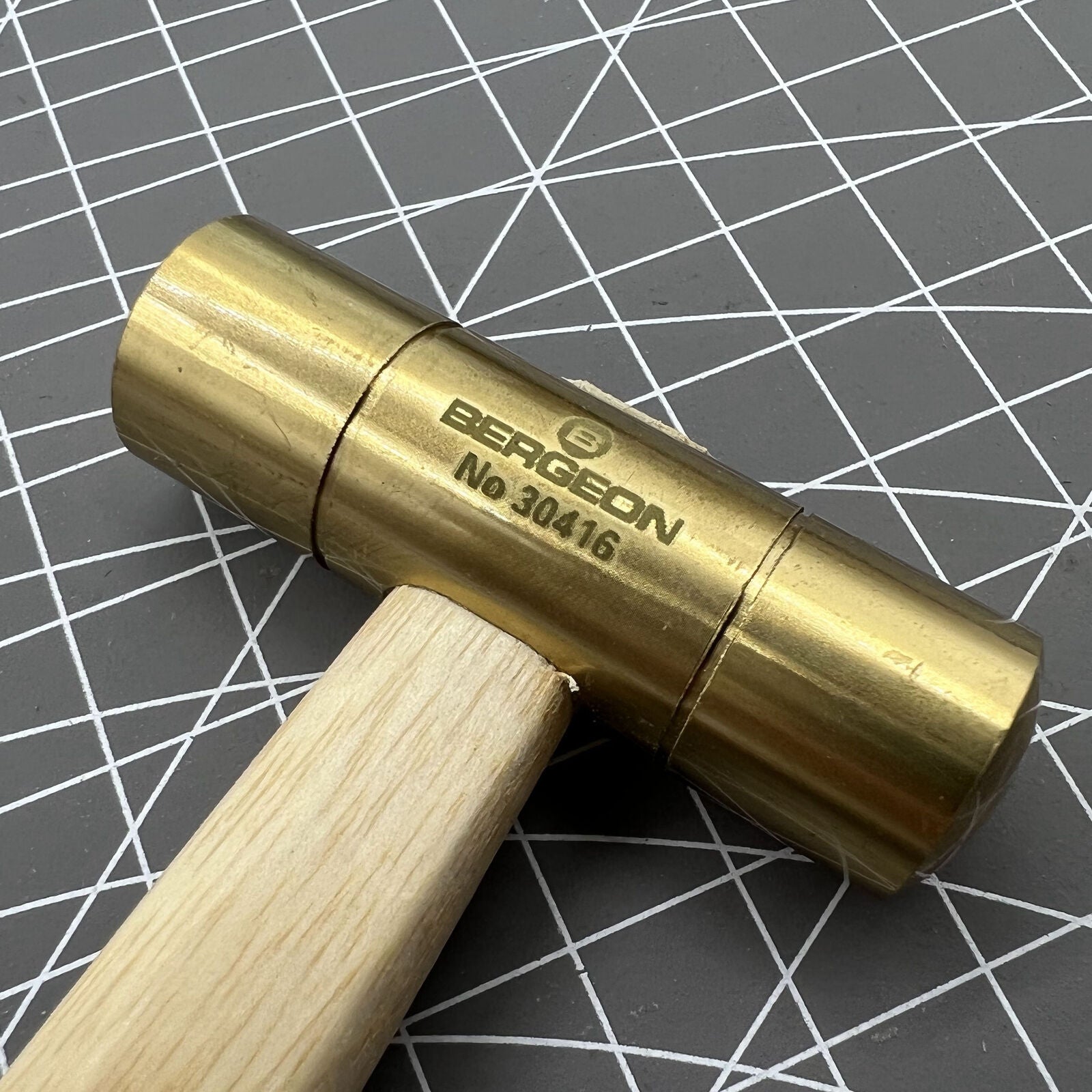 Bergeon 30416 brass hammer by Swiss Made, ideal for precise watch accessory adjustments and repairs.