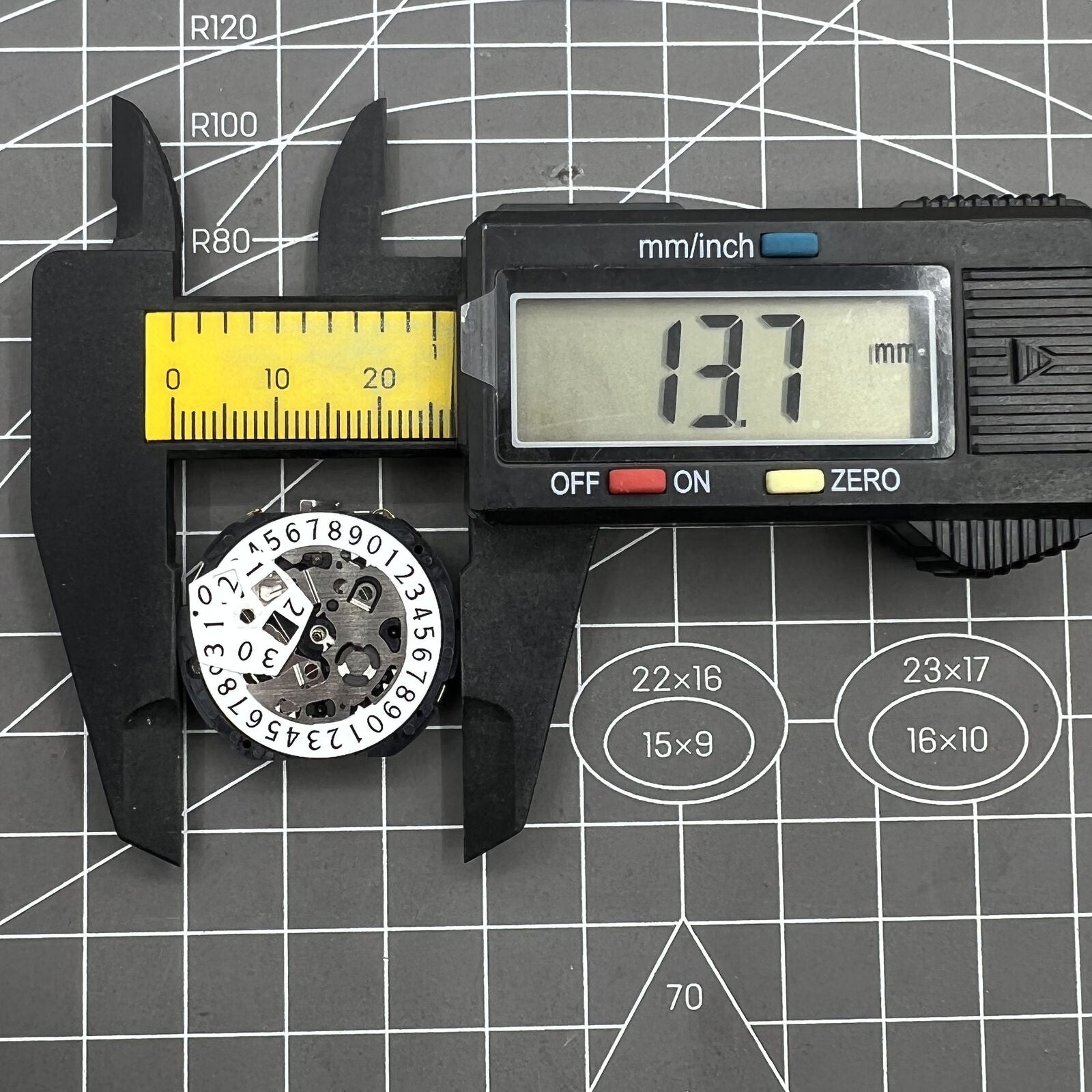 Epson YM04A quartz watch movement showing big date display, ideal for precise watch repairs.