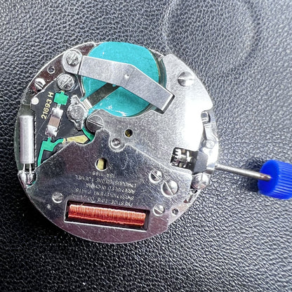 Swiss ISA 1198 quartz watch movement with 3 hands and English day-date display for precise timekeeping.
