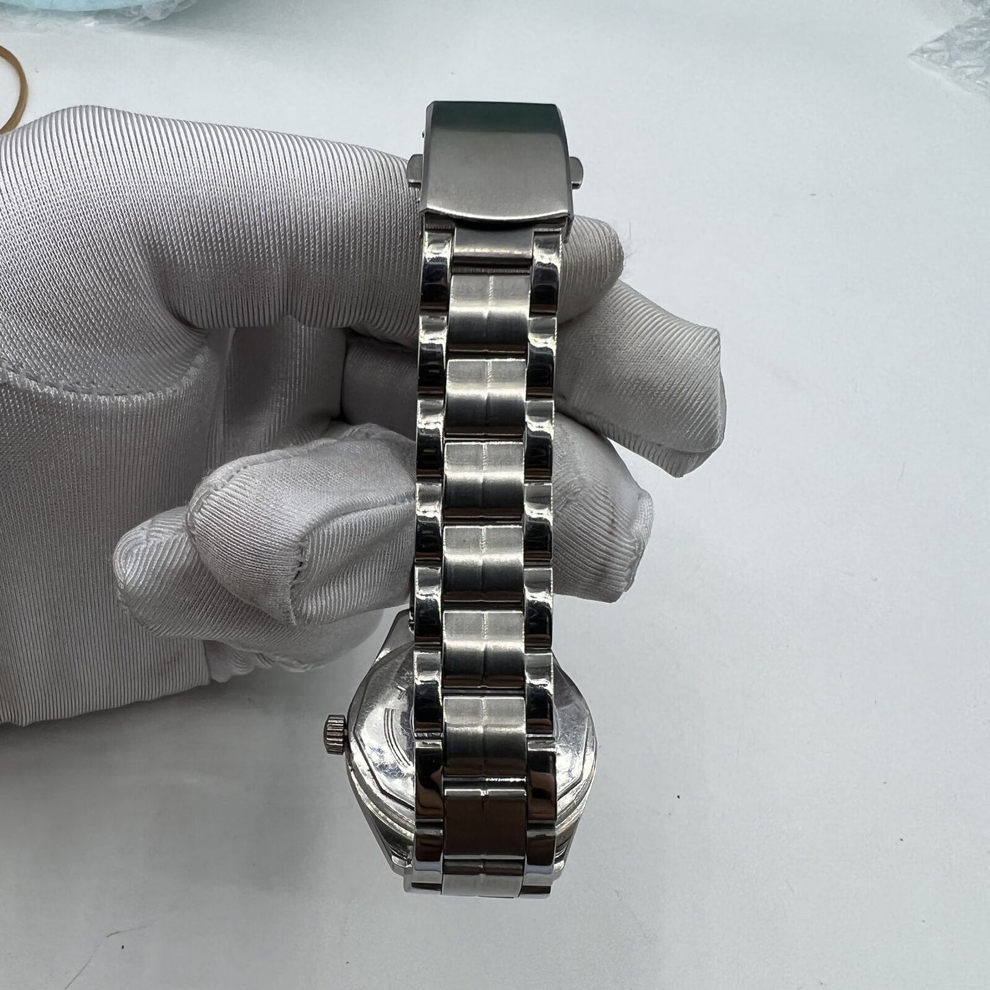 32mm Chinese Taihang manual watch with black dial, golden markers, precision 17-jewel movement for accurate timekeeping