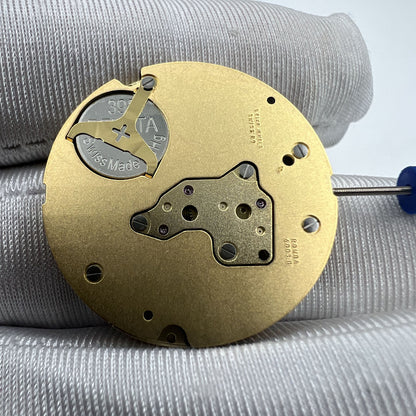 Swiss Ronda 4003B quartz watch movement with date at 12 for precise accessory repairs.