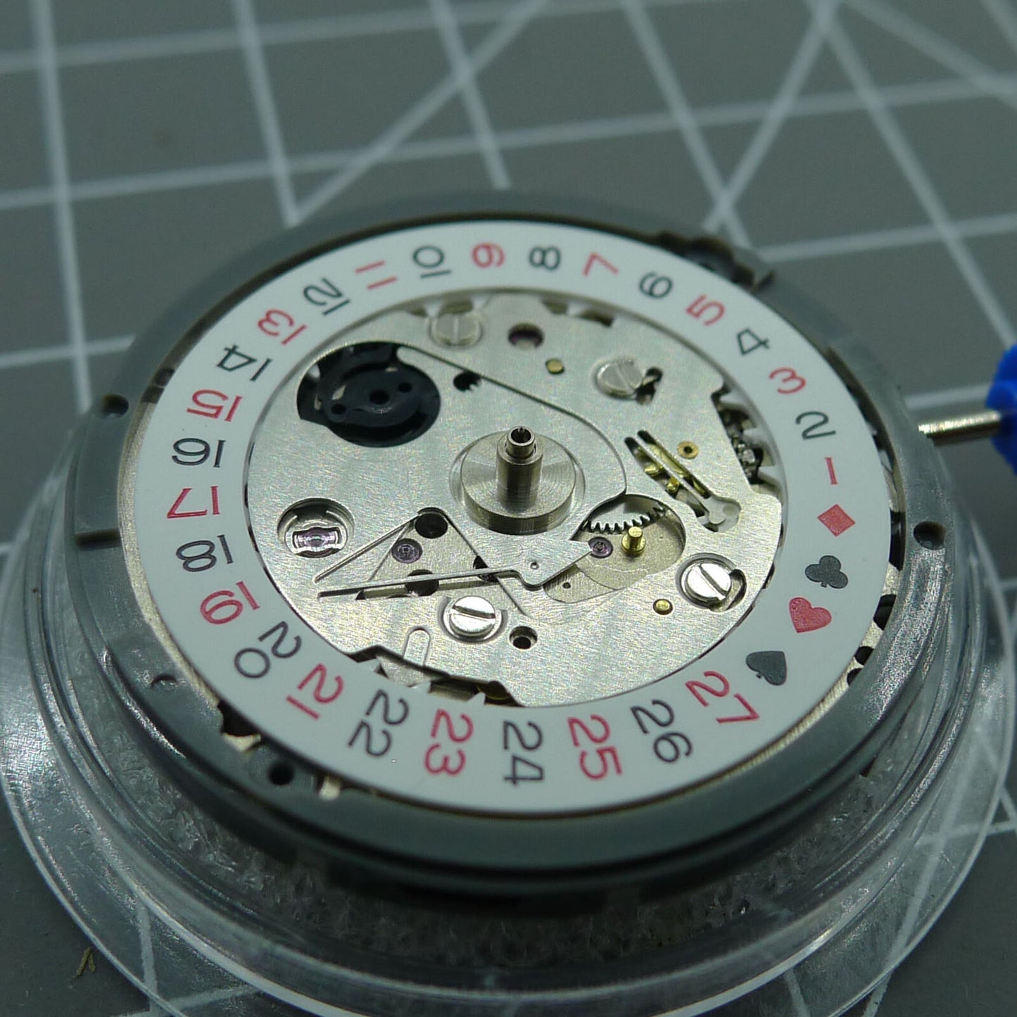 NH35A automatic watch movement with black spade hands and SKX007 style crown by Japan Precision.
