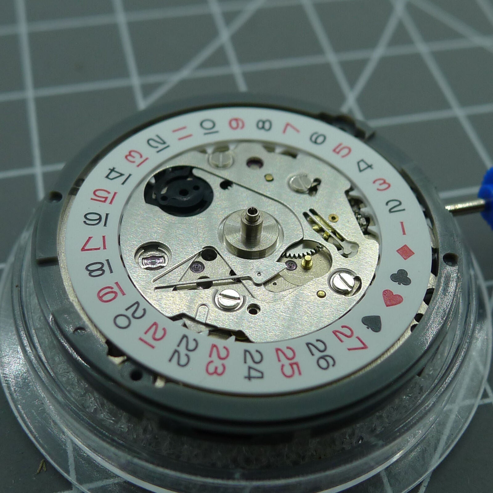 NH35A automatic watch movement with black spade hands and SKX007 style crown by Japan Precision.