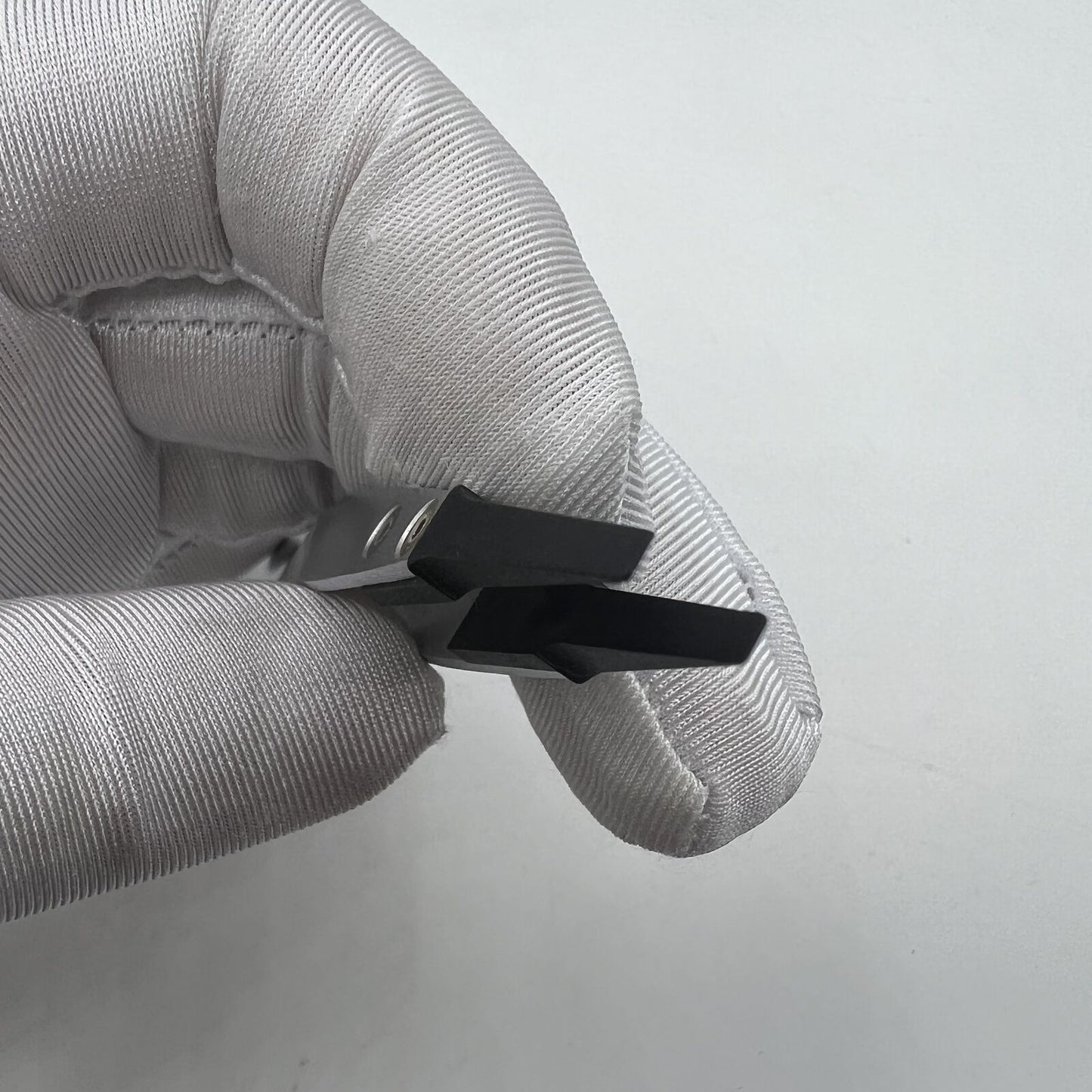 Swiss Made Horotec MSA12.711 carbon fibre tweezers with broad flat tips for precise watch repair and accessory handling.