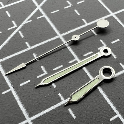 Green luminous watch hands with silver trim for Miyota 2035, 2115, 2105, 2305, 2315 movements.