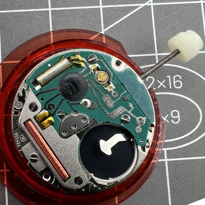 ETA 955.424 quartz watch movement showcasing day, date, and three-hand display for accurate timekeeping.