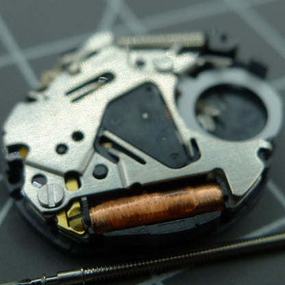Hattori Epson TMI VX82 quartz watch movement with date display at 6 o?clock, Japan made precision.