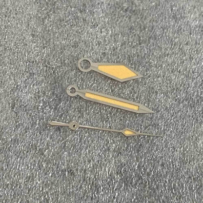 Vintage diamond-shaped watch hands with orange and green lume, silver trim, compatible with NH35/NH36 movements.