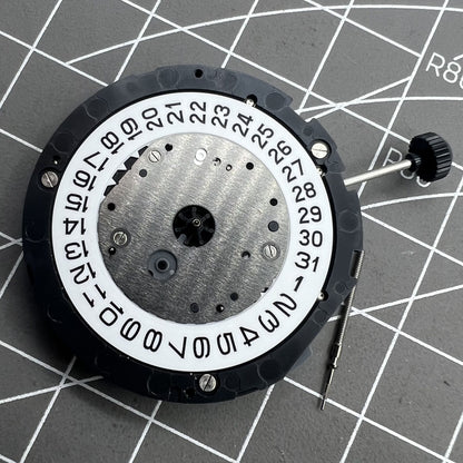 Miyota 6S10 quartz watch movement showing small seconds at 6, 9, 12 o'clock and date window at 3.