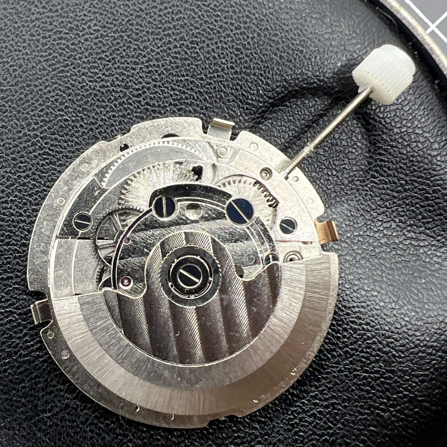 Mechanical automatic watch accessory with multi-function 3 hands and big date display at 12, designed for precision and durability.