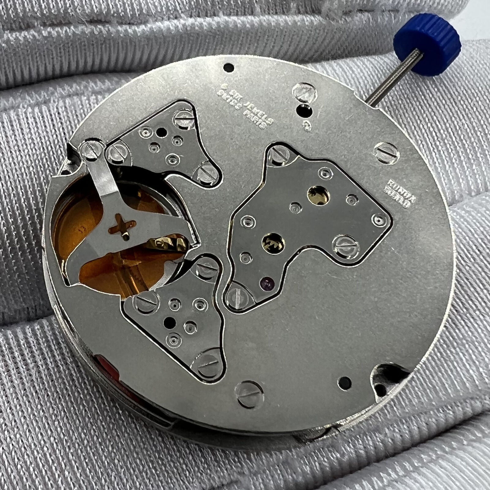 Swiss Ronda 5030D quartz watch movement with date at 4, precise Swiss components by Ronda for watch accessories.