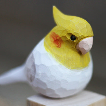 Handmade white phoenix parrot wooden figurine, elegant home or office decor accent.