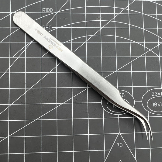 Swiss Bergeon 7026-7 antimagnetic tweezer with fine curved points for precise watch accessory handling.