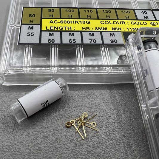 Golden watch hands set in 18 sizes for hour, minute, and second, perfect for precise timepiece repairs.