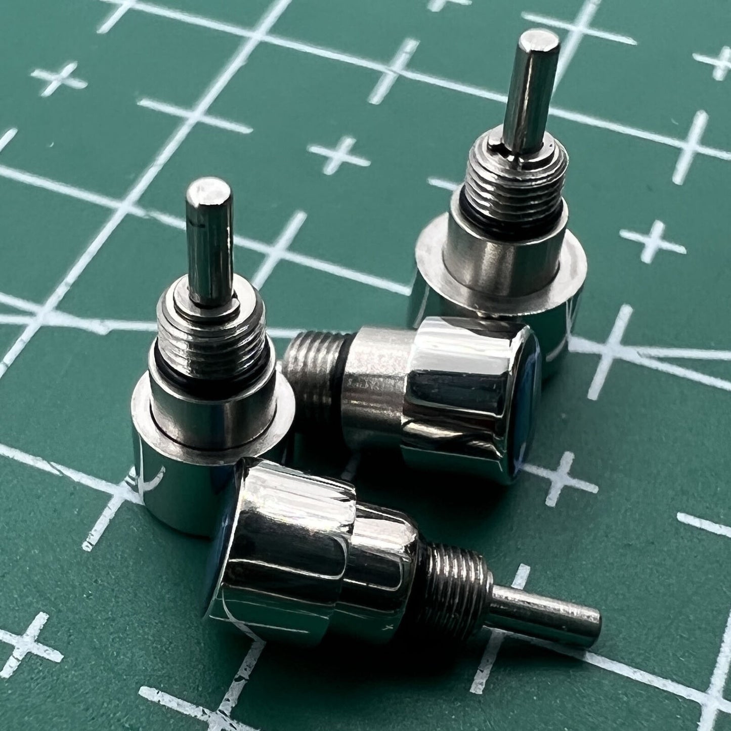 Wholesale Watch stainless steel silver classical pusher with drive-in type mechanism for durable timekeeping.